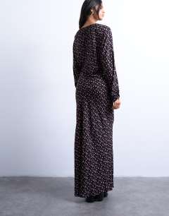 Model wearing Midi long sleeve tea dress in floral print