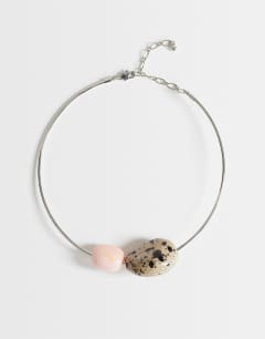 Model wearing Mila choker necklace with pink and dalmatian stones