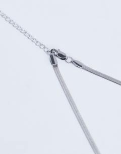 Model wearing Mila waterproof stainless steel 2 pack snake chain necklace in silver