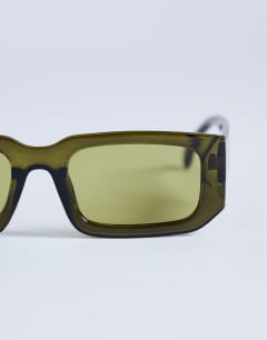Model wearing Milan rectangle sunglasses in olive green