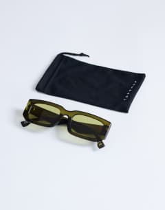 Model wearing Milan rectangle sunglasses in olive green