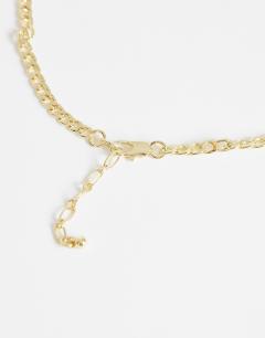 Model wearing Miles statement choker necklace in gold