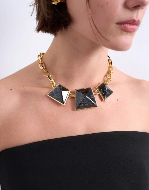 Topshop Milo statement necklace in gold and black ASOS