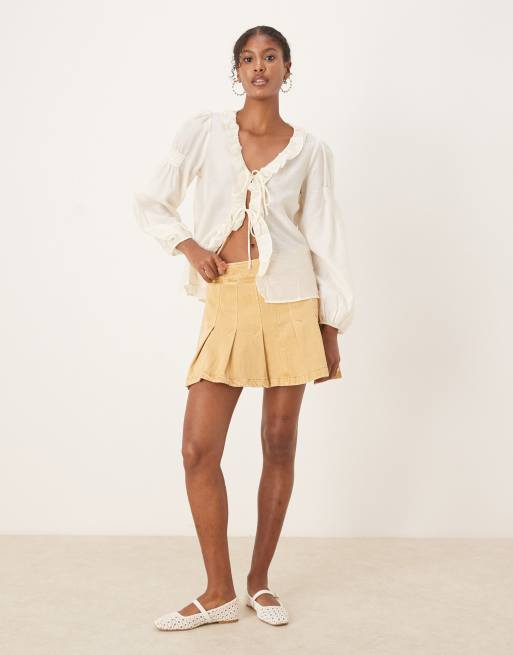 Topshop – Mini-Jeansrock in verwaschenem Senfgelb