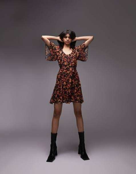 Topshop - Mini-jurk met gestrikte taille en inktachtige print in oranje - view 1