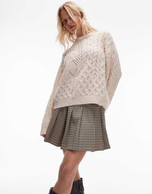 Topshop - Minigonna a pieghe con motivo a quadri pied de poule e vita bassa