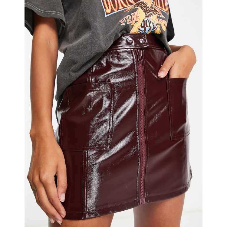 Topshop Minigonna con tasche e zip frontale in vernice bordeaux