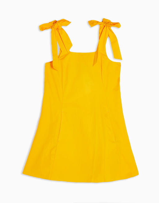 Topshop - Minikjole med bindebånd på skulderen i gul