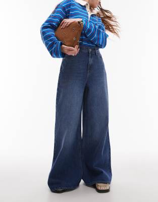 Topshop - Mittelblaue Jeans im 70er-Jahre-Stil mit weitem Bein