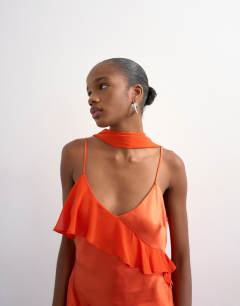 Model wearing Mixed fabric ruffle detail maxi slip in rust