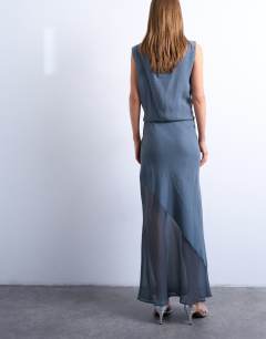 Model wearing Mixed fabric satin bias skirt in blue