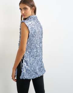 Model wearing Mixed sequin tie side tunic top in blue