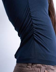 Model wearing Modal ruched slash neck long sleeve top in navy