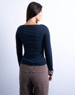 Model wearing Modal ruched slash neck long sleeve top in navy