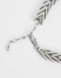 Model wearing Molly snake chain choker in silver