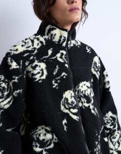 Model wearing Mono floral print fleece borg jacket in rose