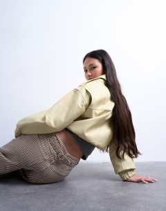 Model wearing Multi stripe cinch trouser in brown
