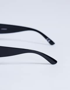 Model wearing Mykonos cat eye sunglasses in black