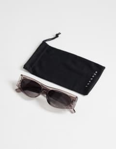 Model wearing Mykonos cat eye sunglasses in grey