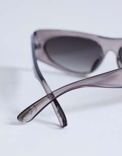 Model wearing Mykonos cat eye sunglasses in tortoise