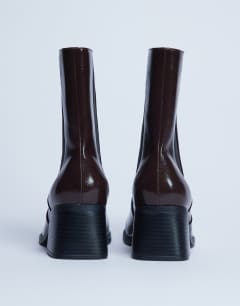 Model wearing Myra block heel chelsea boot in chocolate