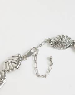 Model wearing Naleigh swirl necklace in silver