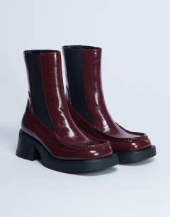 Model wearing Narla square toe chelsea boot in burgundy