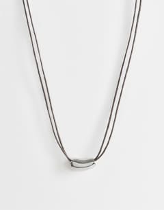 Model wearing Nasha cord necklace in chocolate with silver