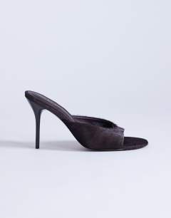Model wearing Nasim high heeled mule in chocolate hair on real leather
