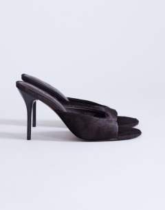Model wearing Nasim high heeled mule in chocolate hair on real leather