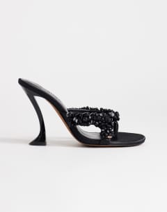 Model wearing Natasha embellished mule high heeled sandal in black