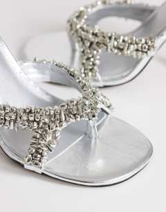 Model wearing Natasha embellished mule high heeled sandal in silver