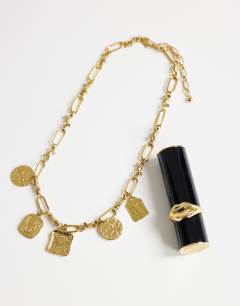 Model wearing Naya waterproof stainless steel chain necklace with charms in gold