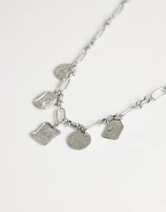 Model wearing Naya waterproof stainless steel chain necklace with charms in silver