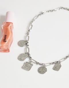 Model wearing Naya waterproof stainless steel chain necklace with charms in silver