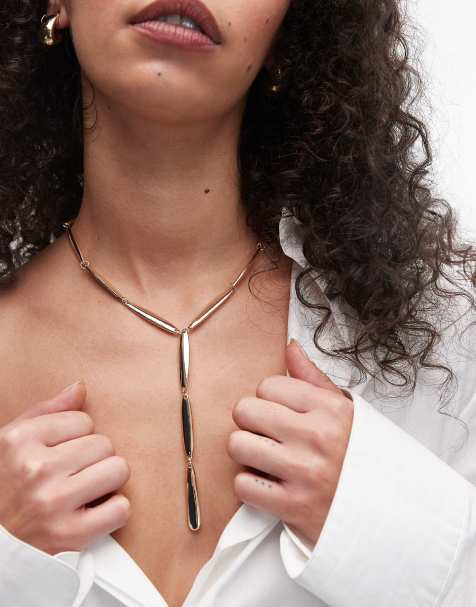 Topshop – Nelia – Guldfärgat statement-halsband i Y-form - view 1