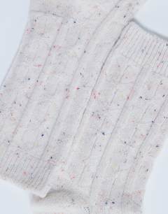 Model wearing Nepp cosy sock in white