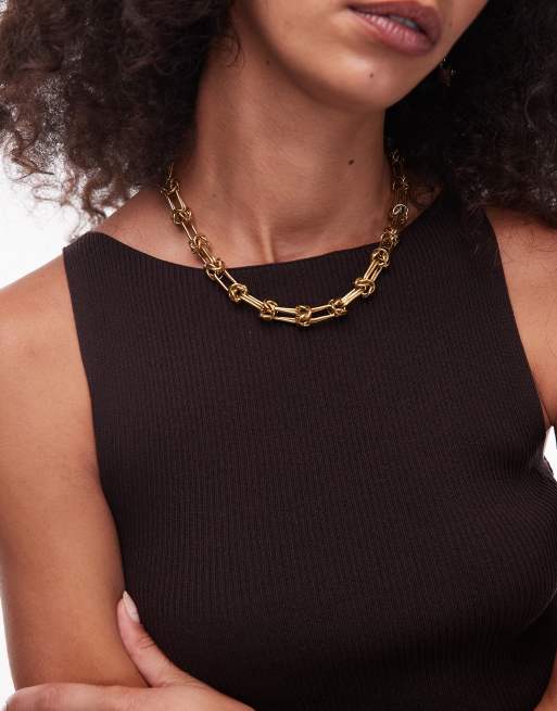 Topshop - Nicky - Collana in acciaio inossidabile waterproof color oro con dettagli annodati