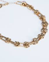 Topshop Nicky waterproof stainless steal knot detailed necklace in gold