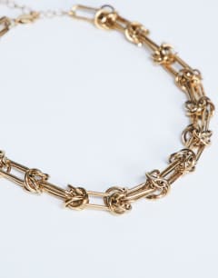 Nicky waterproof stainless steal knot detailed necklace in gold