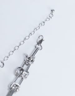 Model wearing Nicky waterproof stainless steel twisted chain necklace in silver
