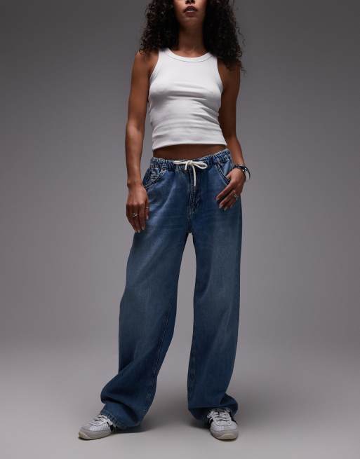 Topshop – Niebieskie jeansy o kroju joggersów z lekkiego denimu