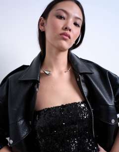 Model wearing Nila teardrop adjustable choker necklace in silver