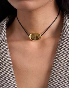 Model wearing Nora choker rope necklace with gem in gold