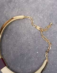 Model wearing Nox hoop necklace with semi precious stone in gold & brown