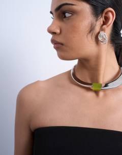 Model wearing Nox hoop necklace with semi precious stone in silver & green