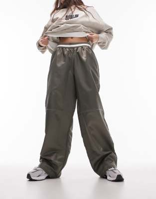 TOPSHOP NYLON BASKETBALL JERSEY WAISTBAND PANTS IN KHAKI-GREEN