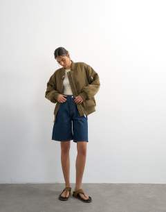 Model wearing Nylon bomber jacket in khaki