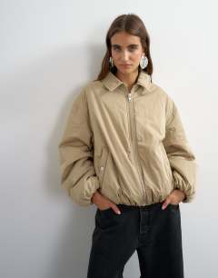 Model wearing Nylon bomber jacket in stone
