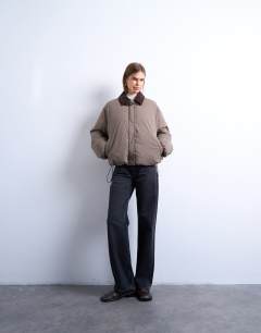 Model wearing Nylon padded car coat with contrast suedette collar in khaki